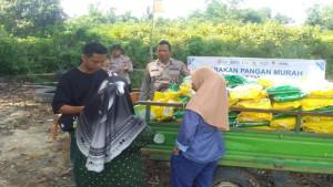 Polres-Ogan-Ilir-Gelar-Gerakan-Pangan-Murah-di-Senuro-Barat-Bantu-Warga-Penuhi-Kebutuhan-Sembako.jpg