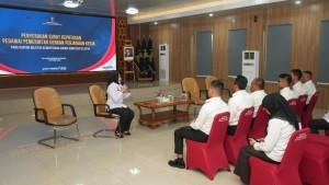 penyerahan-sk-kemenkum-sumsel.jpg