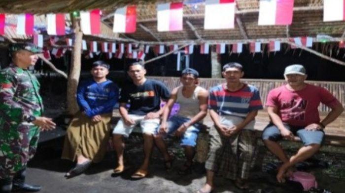 Demi-Warga-Bisa-Tidur-Nyenyak-Anggota-TNI-dan-Masyarakat-di-OKI-Gelar-Patroli-Siskamling.jpg