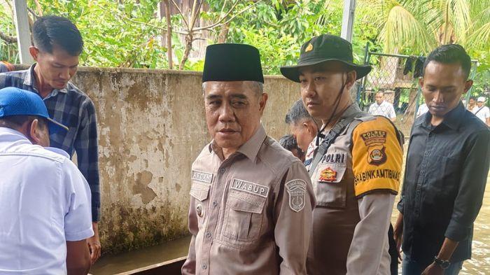 Wabup-Ardani-Tinjau-Banjir-di-Rambang-Kuang-Pastikan-Pelayanan-Kesehatan-dan-Kebutuhan-Masyarakat.jpg
