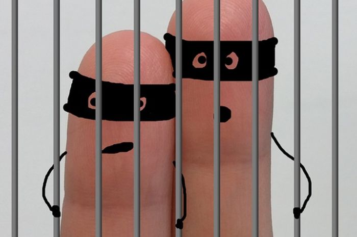 ilustrasi-orang-dipenjara.jpg