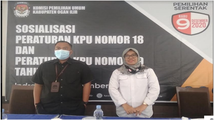 ketua-kpu-ogan-ilir-massuryati-kanan-didampingi-anggota-komisioner-roby-ardiansyah.jpg