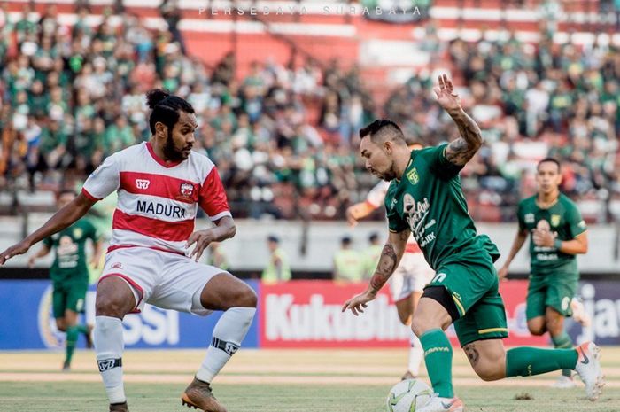 pertandingan-antara-persebaya-vs-madura-united-di-piala-indonesia.jpg
