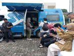 Antusias Warga Palembang Tukar Uang Baru untuk Lebaran, ini Syarat Tukar Uang di Mobil Kas Keliling
