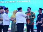 Bupati-Banyuasin-Askolani-Raih-Penghargaan-PMII-Award-2025.jpg