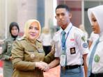 Bupati-Musi-Rawas-Hj-Ratna-Machmud-ketika-membuka-Latihan-Kepemimpinan-Siswa.jpg
