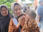 Istri-almarhum-Brigadir-Nurhadi-Elma-Agustina-berharap-pelaku-pembunuhan.jpg