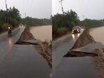 Jalan-penghubung-antara-dua-kecamatan-di-Kabupaten-M.jpg