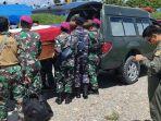 Kelompok-Kriminal-Bersenjata-KKB-dengan-Pos-Satgas.jpg