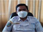 Manajer-Operasional-Damri-Palembang-Galuh-Setyawan-menjelaskan-Damri-Palembang-Kayuagung-2022.jpg