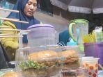 Mencari-Rejeki-di-Hajatan-Warga-Tanjung-Lago-Banyuasin-Setiap-Acara-Selalu-Dipenuhi-Para-Pedagang.jpg