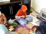 Mengenal-Guwai-Buak-Tradisi-Membuat-Kue-Lebaran-di-Masyarakat-Komering-Sumsel-Penuh-Kebersamaan.jpg