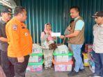 Pj-Bupati-OKU-Serahkan-Bantuan-ke-Korban-Kebakaran-di-Kampung-Baru-Baturaja-Timur.jpg