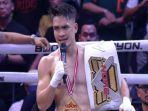 Randy-Pangalila-setelah-pertandingan-kick-boxing-melawan-Kkajhe.jpg