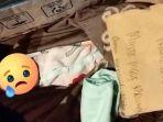 Sosok-bayi-yang-diletakkan-di-depan-pintu-rumah-warga-di-Lingkungan-Tanjung-Batu-Timur.jpg