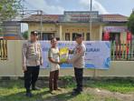 Wakapolsek-Tanjung-Batu-Ipda-M-Toyib-kanan-melayani-warga.jpg