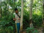 absen-petani-karet-di-lubuklinggau.jpg