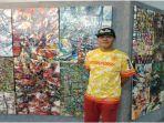 alif-seorang-pelukis-abstrak-asal-palembang-membuat-lukisan-abstrak-rabu-932022.jpg