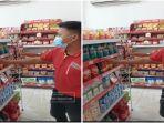 andre-karyawan-minimarket-menunjukan-rak-minyak-goreng-diganti-barang-lain-sabtu-532022.jpg