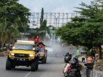 anggota-koti-pp-prabumulih-keliling-semprot-disinfektan-seluruh-jalan-kota-sabtu-1772021.jpg