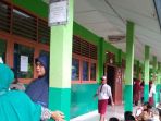 antrean-orangtua-dan-calon-siswa-mendaftar-di-smpn-unggulan-54-palembang_20180321_025010.jpg