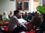 eliza-alex-noerdin-berbincang-dengan-harnojoyo-saat-melayat_20150915_133516.jpg