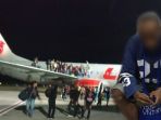 fn-pria-asal-wamena-papua-saat-diamankan-di-bandara-supadio_20180529_231725.jpg