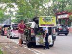 jualan-di-bagasi-mobil-di-jalan-pom-ix-palembang.jpg