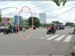 kabel-membahayakan-di-lampu-merah-simpang-4-pim-selasa-28122021.jpg