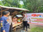 kapolsek-tanjung-raja-iptu-joko-edy-santoso-beri-bansos.jpg