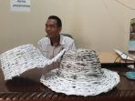 karya-kerajinan-tangan-berbahan-kertas-bekas-yang-disulap-menjadi-sebuah-topi_20180307_185308.jpg
