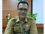 kepala-dispora-kabupaten-muaraenin-rusdi-khairullah.jpg