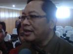 ketua-kpu-sumsel-aspahani-nengok-kiri_20150419_190455.jpg