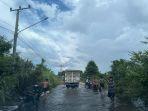 Akses Jalan di Sekayu Kembali Terendam Banjir, Warga Manfaatkan untuk Cuci Kendaraan dan Mancing