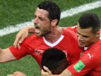 pemain-swiss-blerim-dzemaili-melakukan-selebrasi-seusai-bikin-gol-ke-gawang-kosta-rika_20180628_064523.jpg