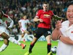 pemimpin-korea-utara-kim-jong-un-ternyata-penggemar-berat-manchester-united.jpg