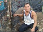 reno-pria-muratara-yang-dibuntuti-babi-hutan-viral.jpg