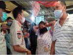 sekda-kota-palembang-saat-turun-ke-pasar-padang-selasa-edukasi-prokes-rabu-2142021.jpg