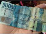 uang-palsu-yang-ditandai-bank-sumsel-babel-tebing-tinggi-empat-lawang.jpg