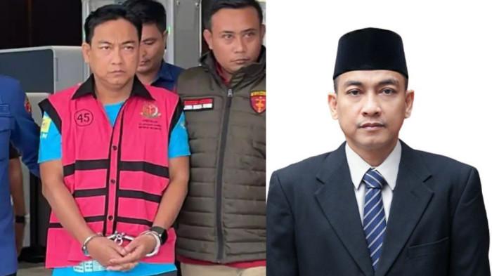 DITANGKAP - Ketua Ombudsman RI, Hery Susanto keluar dengan tangan diborgol dan memakan rompi tahanan Kejagung saat masuk ke dalam mobil tahanan, Jakarta, Kamis (16/4/2026)