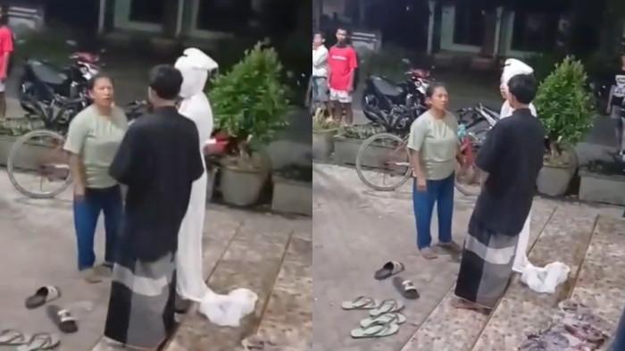 POCONG PALSU - Tangkapan layar seorang pelajar di Kecamatan Kandat, Kabupaten Kediri, Jawa Timur, dikerumunin warga lantaran memakai pakaian seperti pocong pada Selasa (26/5/2026). Video viral yang menampilkan sosok pocong di Kediri, sempat membuat geger warga dan ramai diperbincangkan di media sosial.