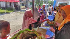 HUT-TNI-Anggota-Polres-Lamongan-Ipda-Purnomo-menggelar-kegiatan-sosial-sedekah.jpg