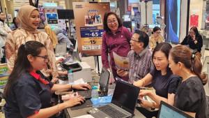 PROMO-LIBURAN-MENARIK-Regional-Head-Bank-Mega-Surabaya-Theresia-Sandhora.jpg