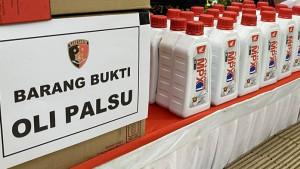 WASPADA-OLI-PALSU-Ilustrasi-oli-palsu-Kepala-Bengke.jpg