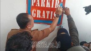 surabaya/memberikan-sanksi-penutupan-area-parkir-toko-modern.jpg