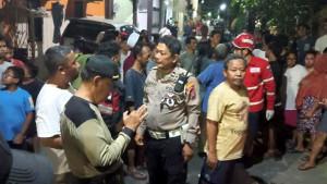 olah-TKP-kasus-bocah-meninggal-tertabrak-mobil-listrik-di-Surabaya.jpg