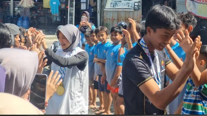 Dua Atlet Panjat Tebing Peraih Emas SEA Games 2025 Pulang Kampung ke Gresik