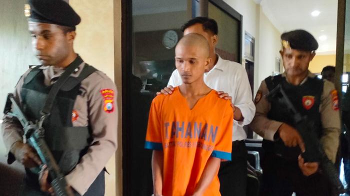 PELAKU-PEMBUNUHAN-Didik-pembunuh-istrinya-sendiri-saat-digelandang-polisi-Polres-Probolinggo.jpg