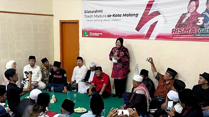 Risma-memberikan-sambutan-saat-bertemu-para-tokoh-Madura-se-Kota-Malang.jpg
