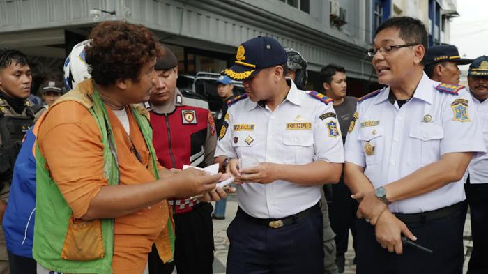 anksi-yang-diberikan-mulai-peringatan-hingga-pencabutan-KTA-Jukir-resmi.jpg